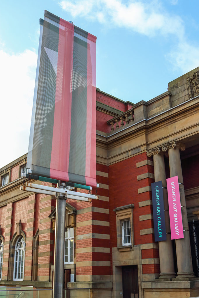 Striped banners outside art gallery
