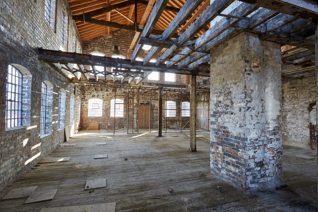 Interior view of Grand Union's new home Junction Works, currently in a dilapidated condition