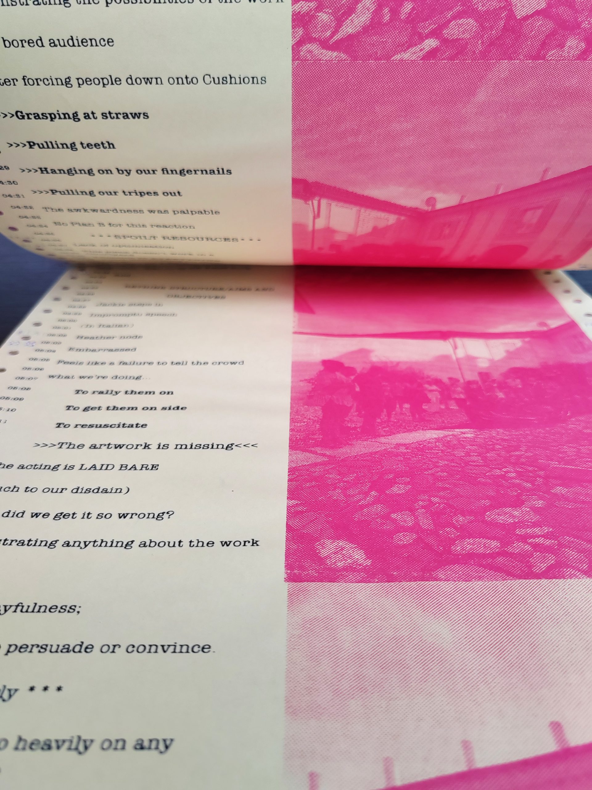 A closeup of a printed text with bright pink images to the right